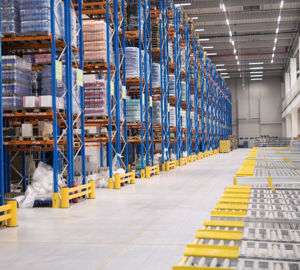 warehouse-storage-interior-with-shelves-loaded-with-goods-scaled.jpg